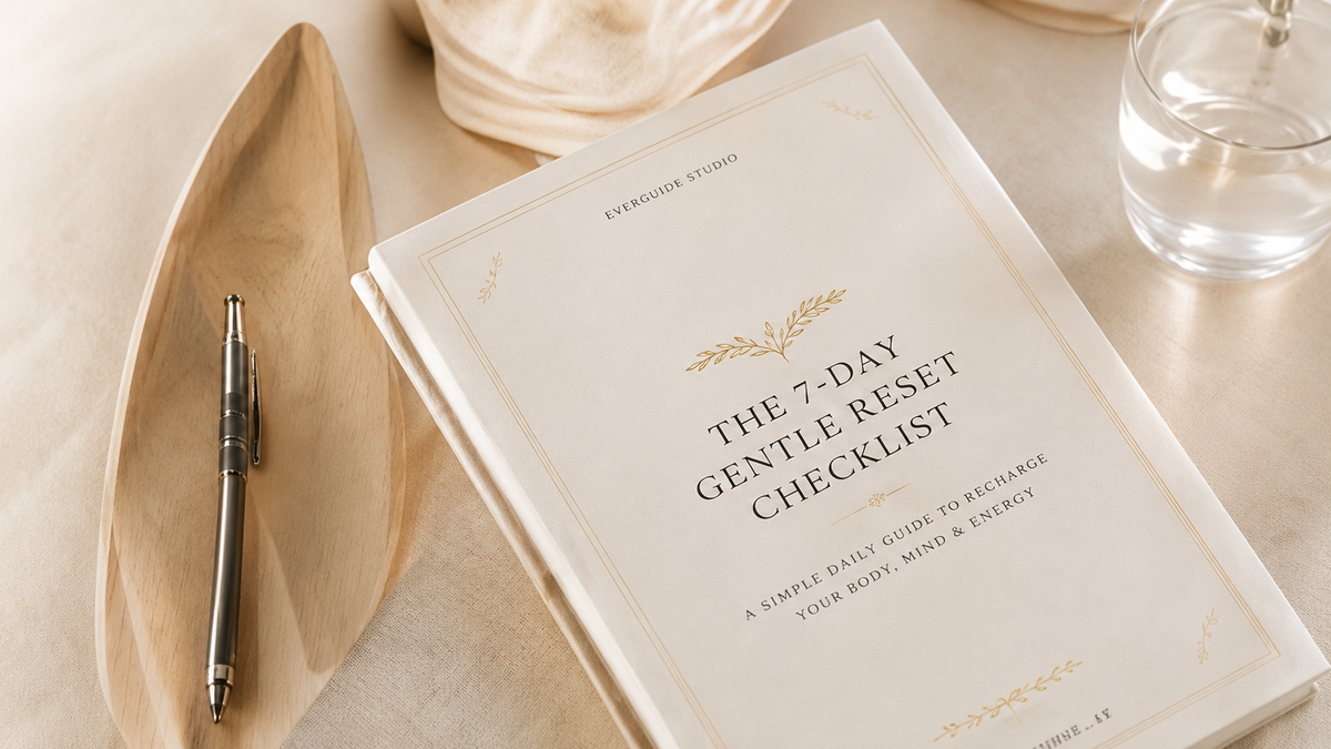 A book on the desk with a title The 7 Day Gentle Reset Checklist